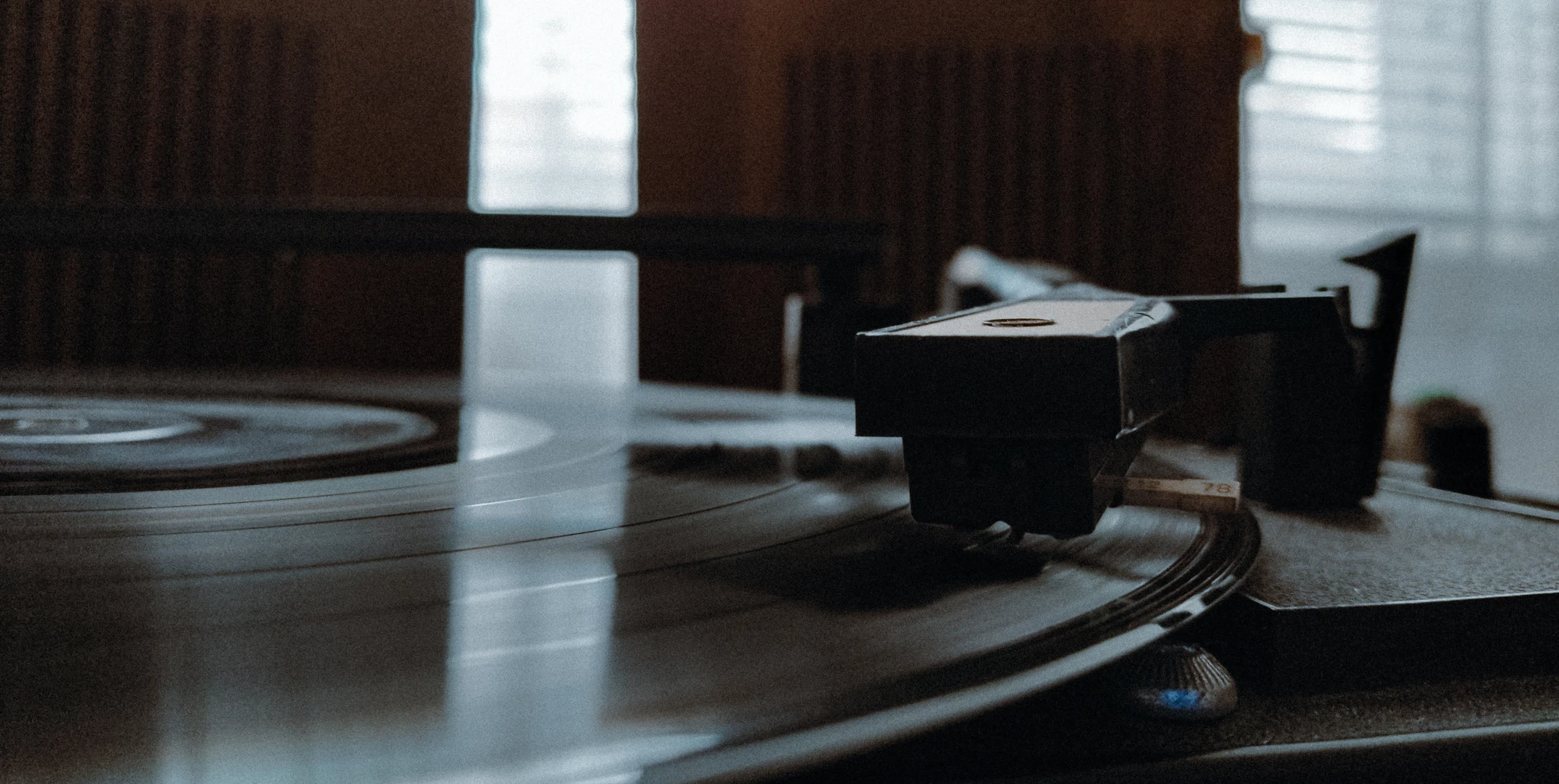 A close-up photo of an old turntable