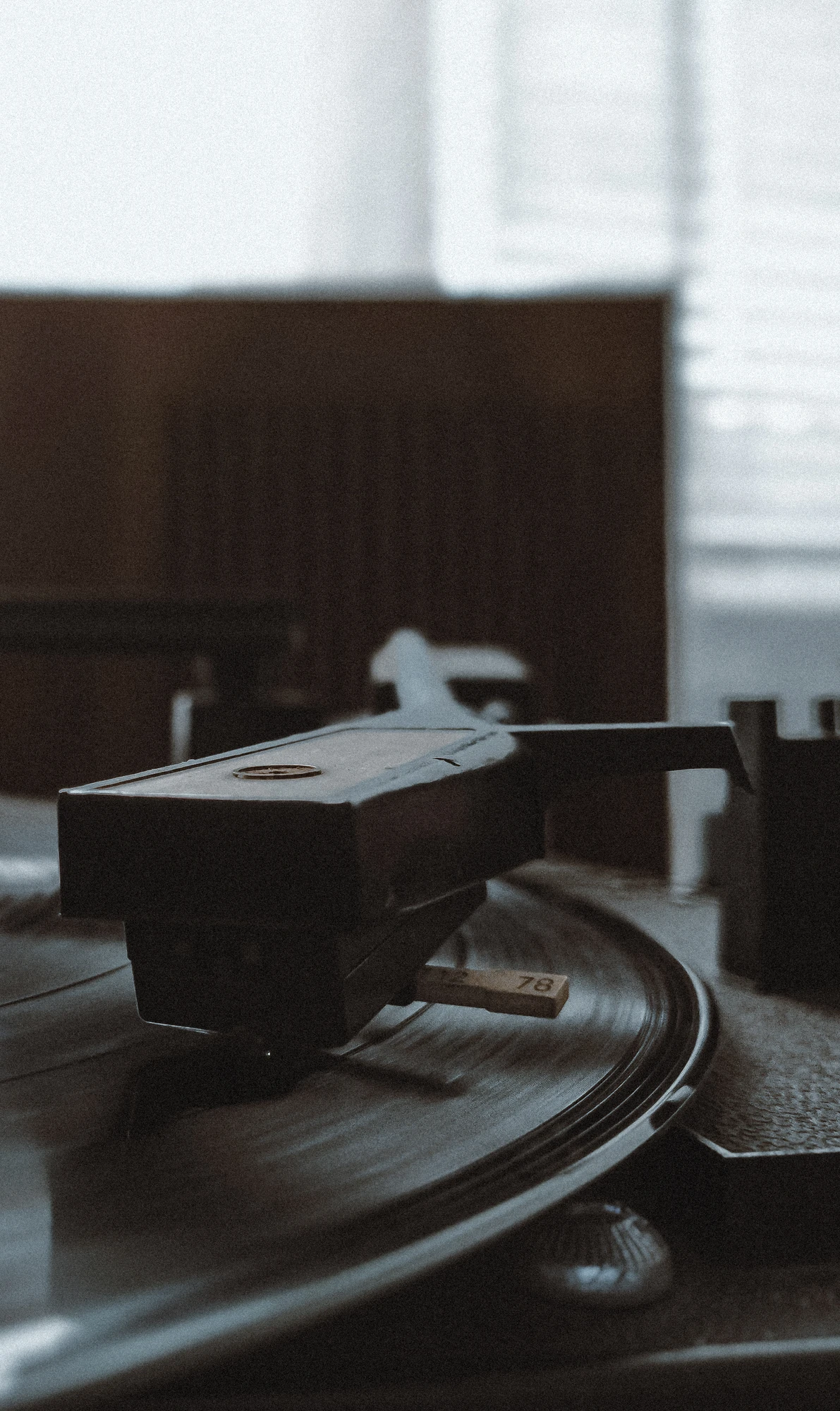 A close-up photo of an old turntable