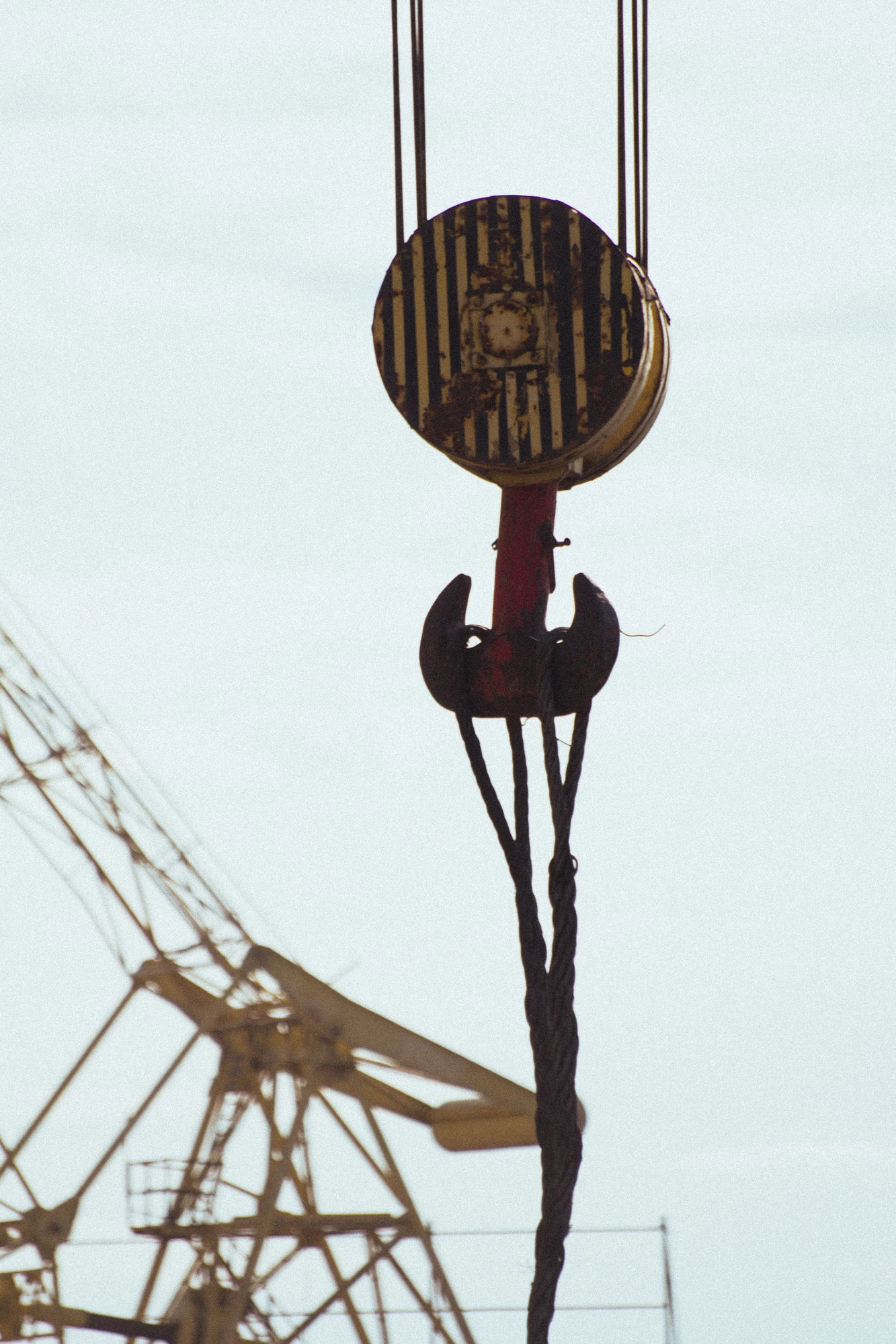 A crane hook with a hanging rope
