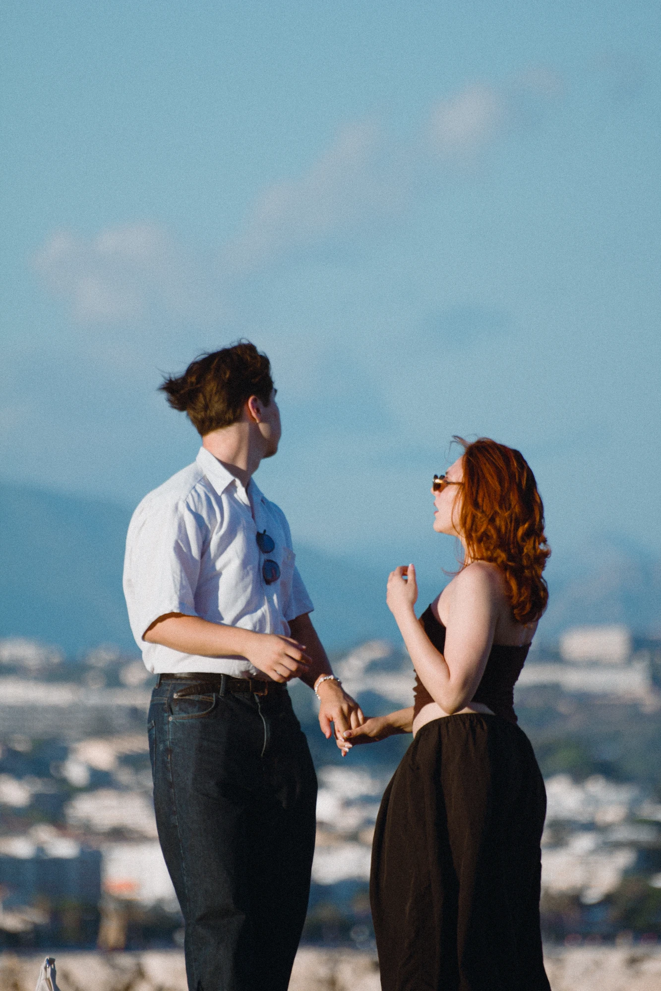 A man and a woman holding hands