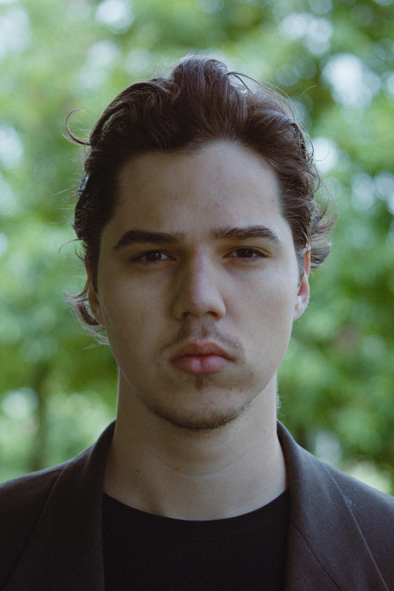 Portrait of a young man in a suit