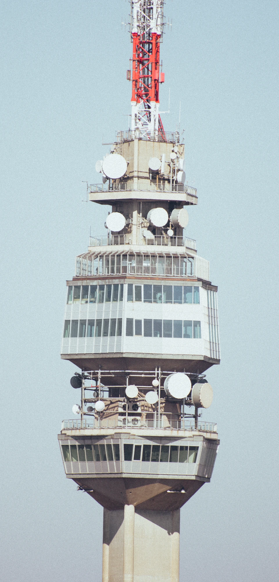 A view of a tall tower with a lot of windows