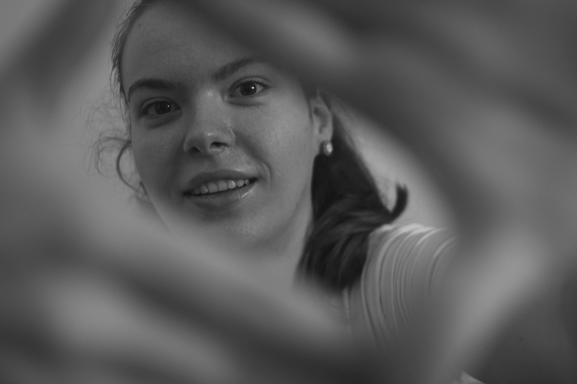 A portrait of a female framig the shot with her hands